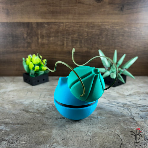 Bulbasaur-Inspired Monster Ball Figure